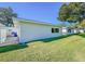 Rear exterior view showing building and lawn at 718 Barber Cir # 718, Lakeland, FL 33803