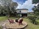 Relaxing backyard with firepit and patio seating at 737 Butternut Pl, Lakeland, FL 33813