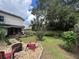 Spacious backyard with firepit and seating area at 737 Butternut Pl, Lakeland, FL 33813