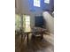 Dining room with a large wooden table, high ceilings and hardwood floors at 737 Butternut Pl, Lakeland, FL 33813