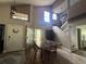 Dining room with a large wooden table, high ceilings and hardwood floors at 737 Butternut Pl, Lakeland, FL 33813