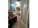 Inviting entryway with wood-look floors and view into living area at 737 Butternut Pl, Lakeland, FL 33813