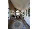 Spacious living room with high ceilings, hardwood floors, and large windows at 737 Butternut Pl, Lakeland, FL 33813