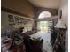 Spacious living room with hardwood floors and access to the backyard at 737 Butternut Pl, Lakeland, FL 33813