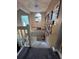 Charming staircase with decorative lighting and Gathering photos at 737 Butternut Pl, Lakeland, FL 33813