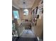 Charming staircase with decorative lighting and Gathering photos at 737 Butternut Pl, Lakeland, FL 33813