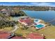 Aerial view of community pool, tennis courts and clubhouse at 14 Casa Loma Way, Lakeland, FL 33813