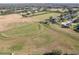 Aerial view highlighting the home's location in a serene rural setting at 1898 Charleston Ln, Bartow, FL 33830