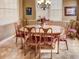 Bright dining room featuring a wood table and six chairs at 1898 Charleston Ln, Bartow, FL 33830