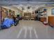 Spacious garage with ample storage and workbench at 1898 Charleston Ln, Bartow, FL 33830