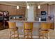 Modern kitchen with wood cabinets and breakfast bar at 1898 Charleston Ln, Bartow, FL 33830