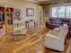 Open living room with hardwood floors and comfortable seating at 1898 Charleston Ln, Bartow, FL 33830