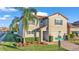 Two-story house with a two-car garage and landscaping at 2325 Bella Luna Cir, Lakeland, FL 33810