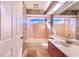Bathroom with shower/tub combo, toilet and a single sink at 4402 Fairway Oaks Ct, Mulberry, FL 33860