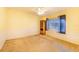 Bedroom with neutral walls, carpeted floors, and a built-in cabinet at 4402 Fairway Oaks Ct, Mulberry, FL 33860