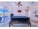 Game room features a pool table, large windows, and access to a deck at 4402 Fairway Oaks Ct, Mulberry, FL 33860
