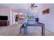 Spacious game room with a pool table and access to the backyard at 4402 Fairway Oaks Ct, Mulberry, FL 33860