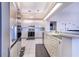 Kitchen features stainless steel appliances and green countertops at 4402 Fairway Oaks Ct, Mulberry, FL 33860