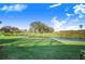 View of the canal from the backyard at 4402 Fairway Oaks Ct, Mulberry, FL 33860