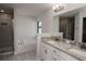 Modern bathroom with double vanity and shower at 4645 Grandview Glen Dr, Auburndale, FL 33823