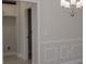 Convenient laundry room with built-in shelving and flooring at 4645 Grandview Glen Dr, Auburndale, FL 33823