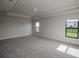 Large main bedroom with carpet and window views at 4645 Grandview Glen Dr, Auburndale, FL 33823