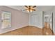 Spacious bedroom featuring hardwood floors and double closets at 5873 Macaw Pl, Lakeland, FL 33809