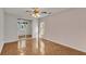 Bright bedroom with hardwood floors and sliding glass doors at 5873 Macaw Pl, Lakeland, FL 33809
