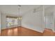 Simple dining room with light walls and wood floors at 5873 Macaw Pl, Lakeland, FL 33809