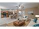 Open kitchen with island, stainless steel appliances, and wood cabinets at 7018 Cascades Ct, Lakeland, FL 33813