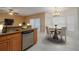 Kitchen with wood cabinets, granite countertops, and breakfast nook at 7018 Cascades Ct, Lakeland, FL 33813