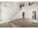Bright living room with high ceilings, hardwood floors, and an open concept design at 7018 Cascades Ct, Lakeland, FL 33813