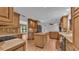 Modern kitchen with an island and wood cabinets at 9240 Moore Rd, Lakeland, FL 33809