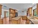 Modern kitchen with ample cabinetry, granite countertops and stainless steel appliances at 9240 Moore Rd, Lakeland, FL 33809