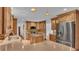 Updated kitchen featuring wood cabinets, granite countertops, and an island at 9240 Moore Rd, Lakeland, FL 33809