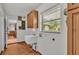 Laundry room with a utility sink and built-in cabinets at 9240 Moore Rd, Lakeland, FL 33809