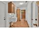 Laundry room with utility sink and access to bathroom at 9240 Moore Rd, Lakeland, FL 33809