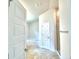 Bright bathroom featuring a soaking tub and walk-in shower at 1230 Tagliamento Ln, Haines City, FL 33844