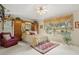 Main bedroom with a king-size bed and built-in cabinetry at 150 Woodcrest Ln, Mulberry, FL 33860