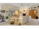 Bright living room featuring comfortable sofas and a fireplace at 150 Woodcrest Ln, Mulberry, FL 33860