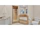 Bathroom with shower, bathtub, and updated vanity at 1555 Archers Path, Lakeland, FL 33809