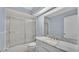Clean bathroom, featuring a marble vanity and shower/tub combo at 1555 Archers Path, Lakeland, FL 33809