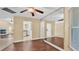 Bright dining room with hardwood floors and kitchen views at 1555 Archers Path, Lakeland, FL 33809