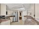 Kitchen with stainless steel appliances and granite counters at 1555 Archers Path, Lakeland, FL 33809