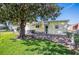 Spacious backyard with mature tree and brick patio at 1610 Reynolds Rd # 79, Lakeland, FL 33801