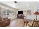 Spacious living room with hardwood floors and fireplace at 1610 Reynolds Rd # 79, Lakeland, FL 33801