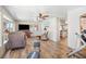 Open living room with home gym and view into kitchen at 1610 Reynolds Rd # 79, Lakeland, FL 33801