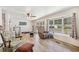 Bright living room featuring hardwood floors and home gym at 1610 Reynolds Rd # 79, Lakeland, FL 33801
