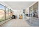 Spacious screened porch with tile floor and exterior access at 1610 Reynolds Rd # 79, Lakeland, FL 33801