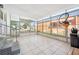 Bright screened porch with tile floor and plenty of natural light at 1610 Reynolds Rd # 79, Lakeland, FL 33801